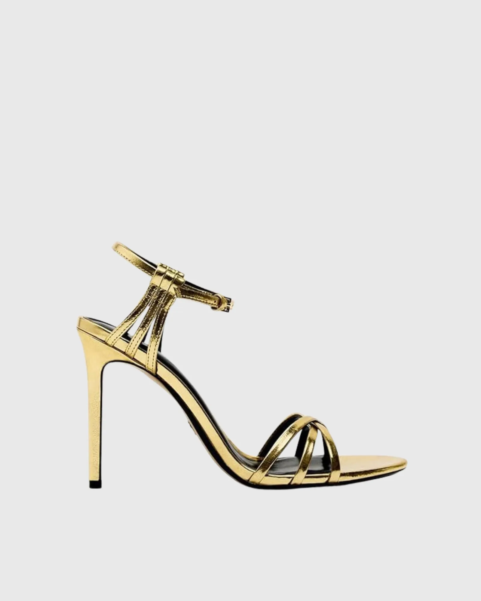 Selini Cross Metallic Strap Sandals In Gold