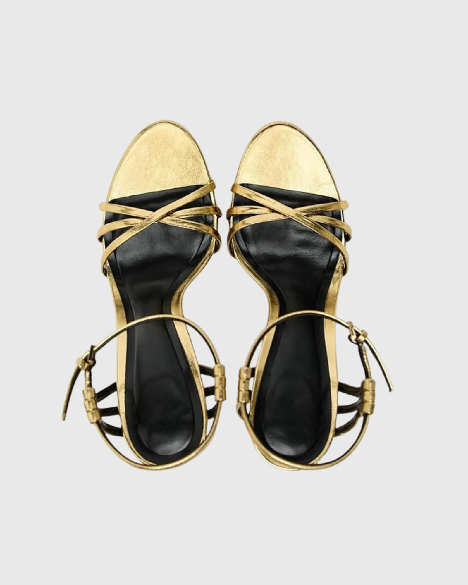 Selini Cross Metallic Strap Sandals In Gold